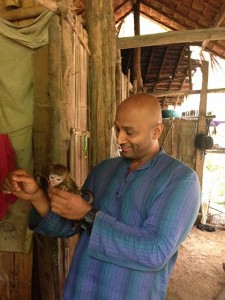 Playing with a Monkey in a Village in the Rainforest. Touristy? Sure. Awesome? Yes!