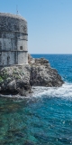 The Old Town Wall hits the sea